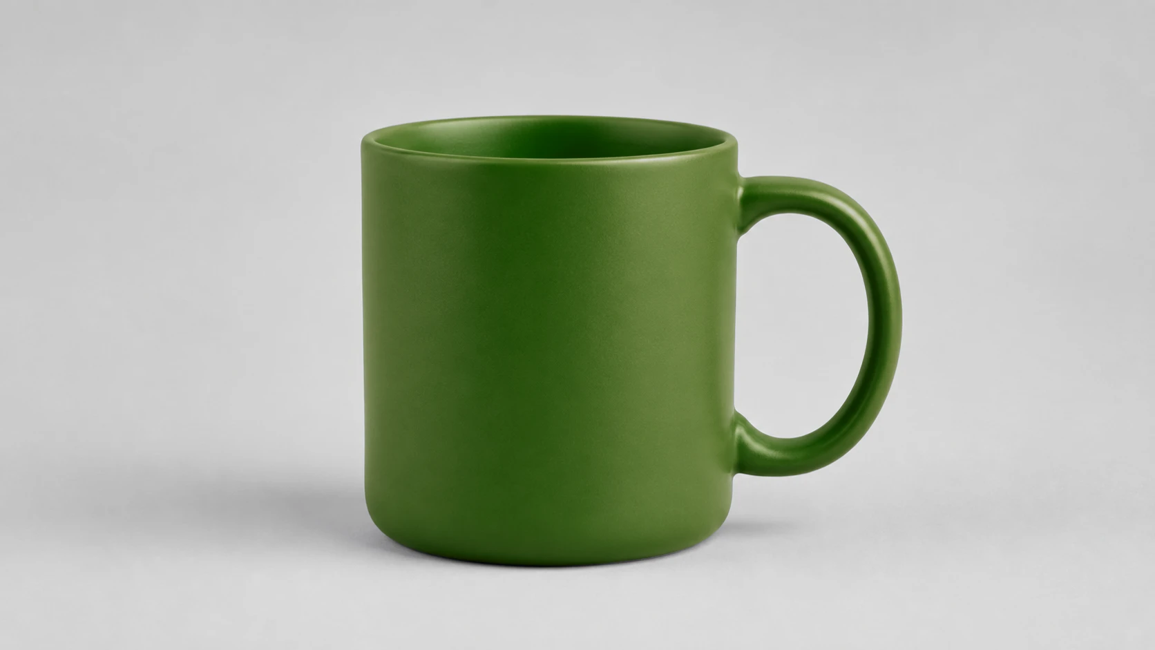 The same mug recolored to forest green with its shading intact