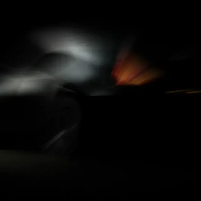 Same car with a strong radial motion blur for a dynamic cinematic look