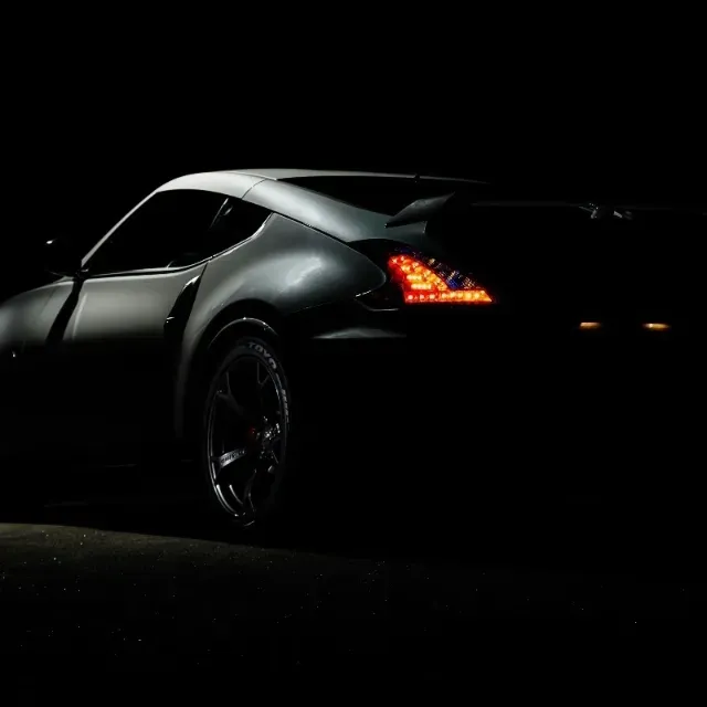 Sports car photographed at night before any motion blur effect is applied